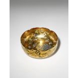 A JAPANESE SATSUMA BOWL BY SENZAN MEIJI PERIOD, 20TH CENTURY The lobed body richly decorated with