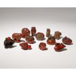 A COLLECTION OF THIRTEEN WOOD AND LACQUER NETSUKE EDO PERIOD AND LATER, 18TH AND 19TH CENTURY Most