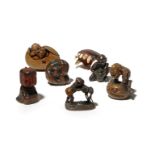 SEVEN JAPANESE NETSUKE MEIJI PERIOD, 19TH CENTURY One made of the lacquered jaw of a small