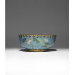 A CHINESE CLOISONNE 'FOUR SEASONS' BOWL QING DYNASTY Decorated with sprays of lotus, peony, prunus