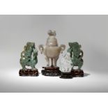 FOUR CHINESE HARDSTONE CARVINGS 19TH CENTURY Comprising: a pair of spinach-green jade vases formed