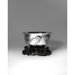 A CHINESE SILVER 'PRUNUS' BOWL 2ND HALF 19TH CENTURY Decorated with four blossoming prunus trees,