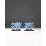 A PAIR OF CHINESE ENAMEL 'LOTUS' BOWLS 18TH/19TH CENTURY Each decorated to the exterior with
