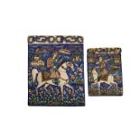 TWO QAJAR POLYCHROME MOULDED TILES 19TH CENTURY The larger tile decorated with a figure carrying a
