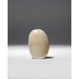 A CHINESE CELADON JADE PEBBLE SNUFF BOTTLE 18TH/19TH CENTURY Naturalistically shaped as a pebble,