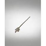 A CHINESE PARCEL-GILT SILVER HAIRPIN TANG DYNASTY Formed as a two-pronged pin terminating in a