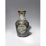 A CHINESE CLOISONNE VASE 19TH CENTURY The ovoid body decorated with four large panels enclosing a