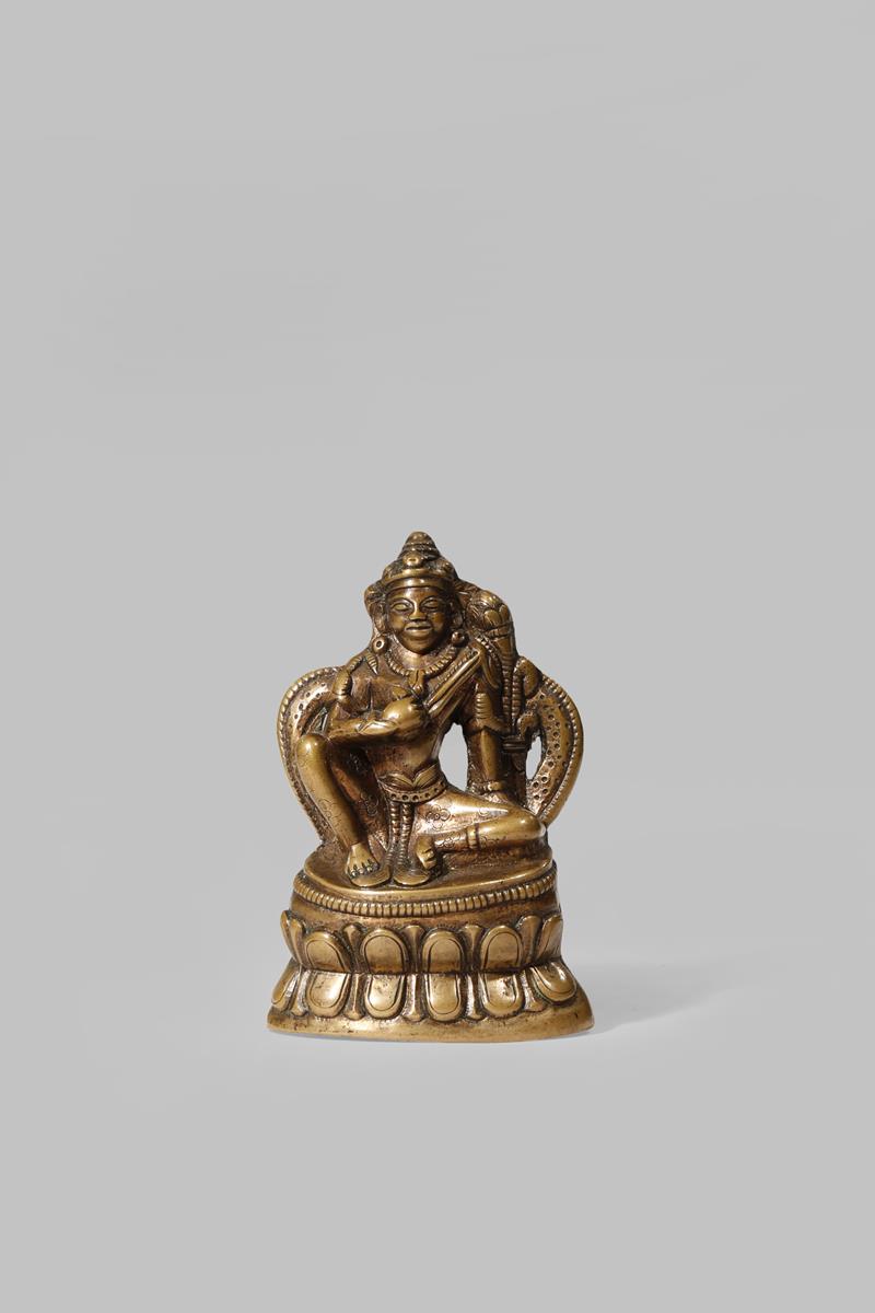 A RARE TIBETAN PALA-STYLE BRONZE FIGURE OF TARA 13TH CENTURY OR EARLIER Seated in lalitasana,