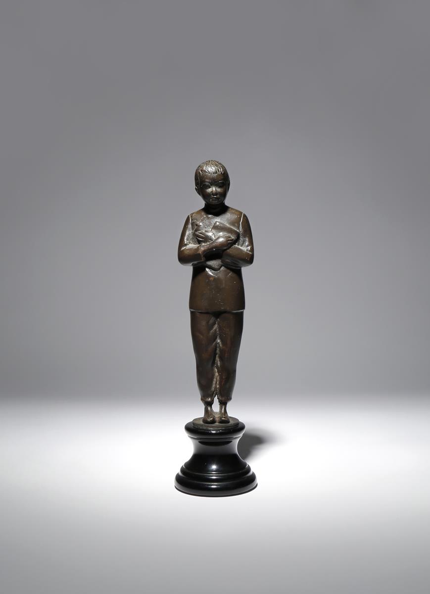 A CHINESE BRONZE FIGURE OF A RED GUARD 20TH CENTURY Depicted standing dressed in simple clothes, she