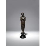A CHINESE BRONZE FIGURE OF A RED GUARD 20TH CENTURY Depicted standing dressed in simple clothes, she