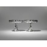A PAIR OF CHINESE SILVER TAZZE 2ND HALF 19TH CENTURY The stems formed as dragon-carp, each