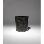 A CHINESE ZITAN 'BAMBOO' BRUSHPOT, BITONG QING DYNASTY Carved to one side with many leafy bamboo