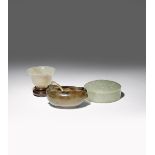 THREE CHINESE HARDSTONE ITEMS QING DYNASTY Comprising: a celadon jade circular box and cover