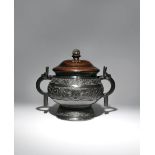 A LARGE CHINESE BRONZE ARCHAISTIC FOOD VESSEL, GUI MING/QING DYNASTY Cast with taotie masks and