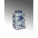 A LARGE CHINESE BLUE AND WHITE 'LION DOGS' TEA CANISTER AND COVER 19TH CENTURY The square-section