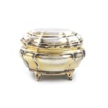 A Victorian silver-gilt tea caddy / sugar box, by Charles Stuart Harris, London 1894, retailed by