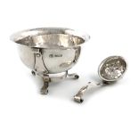 By John Round & Son Ltd, an Edwardian Art Nouveau silver sugar bowl and sifting spoon, Sheffield