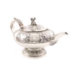 λA George IV silver teapot, by William Traies, London 1824, circular bellied form, embossed
