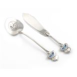 By R W Hewett & Co., An Edwardian Art Nouveau silver and enamel butter knife and jam spoon,