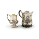 A Victorian silver mug, by The Barnards, London 1845, panelled baluster form, leaf capped scroll