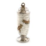 By Tiffany and Co., a late 19th century American silver and silver-gilt pepper pot, Edward Moore