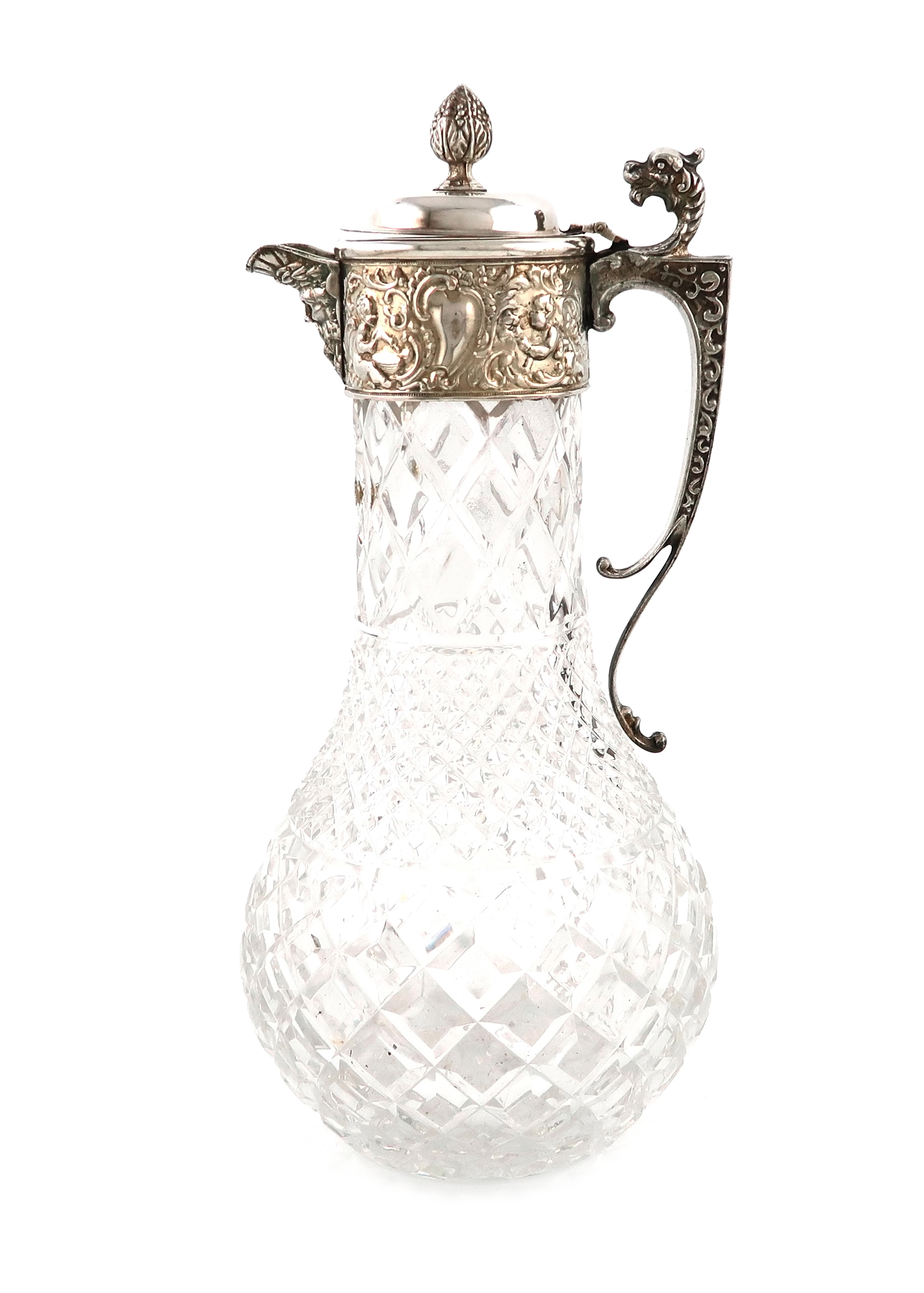 A modern electroplated mounted claret jug, unmarked, the baluster cut glass body with hob-nail