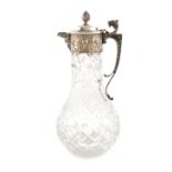 A modern electroplated mounted claret jug, unmarked, the baluster cut glass body with hob-nail