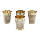 A set of four 18th century German miniature silver beakers, maker's mark of CS, also marked 12,
