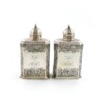 A pair of George I silver tea caddies, by John Farnell, London 1721, upright rectangular form,
