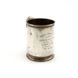 An Edwardian silver presentation mug, by The Goldsmiths and Silversmiths Company, London 1907,