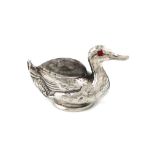 A novelty silver duck pin cushion, by Crisford and Norris, Birmingham 1911, modelled in a swimming