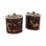 A pair of electroplated and faux tortoiseshell tea caddies, unmarked, oval form, hinged foliate