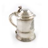 An Edwardian silver tankard, by Mappin and Webb, London 1910, tapering circular form, scroll