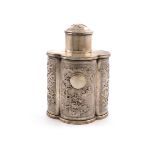 A Chinese silver tea caddy, maker's mark of WA, lobed oval cylindrical form, with panels of