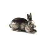 An Edwardian silver novelty rabbit pin cushion, by H. Matthews, Birmingham date letter worn,