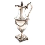 λA George III silver ewer, by John Carter, London 1773, vase form, with medallions and swags above