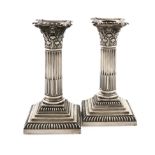 A matched pair of late-Victorian silver candlesticks, by William Hutton and Sons, Sheffield and