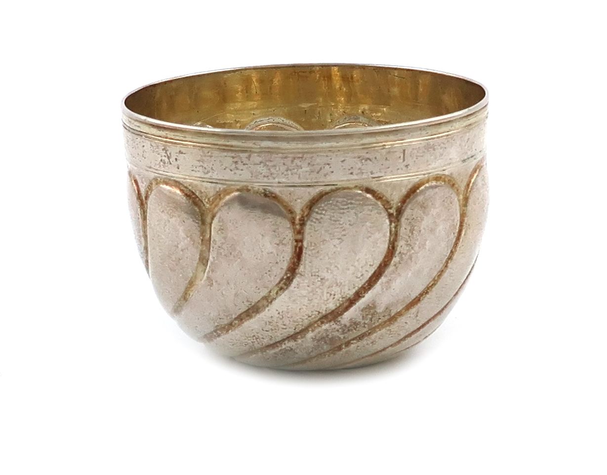 An early 18th century German silver-gilt tumbler cup, maker's mark worn, Augsburg, circa 1720,