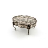 An Edwardian silver dressing table box, with import marks for Chester 1903, importer's mark of