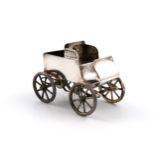 A novelty electroplated table vesta holder, unmarked, modelled as an early vintage car with a