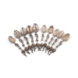 A set of six cast silver naturalistic teaspoons, unmarked, probably 19th century, leaf shaped bowls,