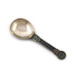 A Norwegian silver-gilt and plique-a-jour enamel spoon, by J. Tostrup, Oslo, fig-shaped bowl, with