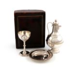 A three-piece Victorian silver travelling communion set, by The Barker Brothers, Birmingham 1887,