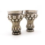 A pair of continental silver beakers, bearing pseudo 18th century Russian marks, tapering lobed