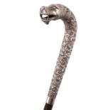 An Indian silver cane/parasol handle, maker's mark of D.C, and also marked 90, modelled as a tiger's