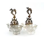 A pair of Victorian parcel-gilt silver handled rock crystal double salt cellars, one by Robert