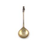 A continental silver-gilt Apostle spoon, marked in the bowl with a W and with a device above,