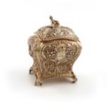 An electro-gilded tea caddy, circa 1900, rounded rectangular bombé form, with Rococo figures and