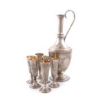 A Russian silver ewer and six vodka cups, 1927-1958, the ewer of baluster form, engraved foliate