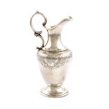 A Victorian silver cream jug, by Stephen Smith, London 1846, baluster form, scroll handle,